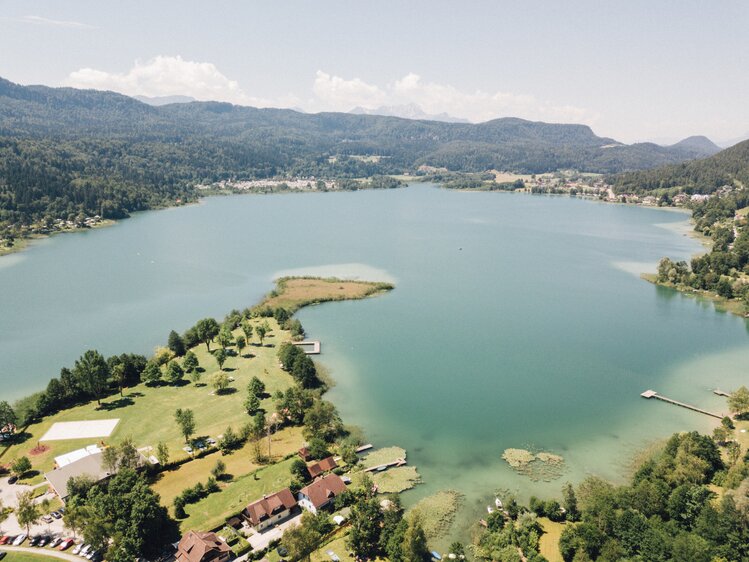 See mit Häusern am Ufer | © Urlaub am Bauernhof Kärnten/ Daniel Gollner