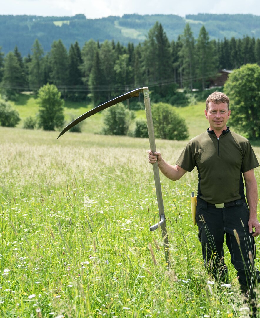 Bauer beim Mähen | © Urlaub am Bauernhof im SalzburgerLand / Matthias Gruber