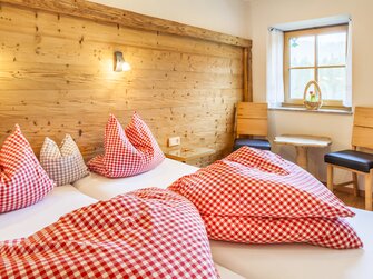 Schlafzimmer am Wohlfühlbauernhof Bambichlgut | © Urlaub am Bauernhof im SalzburgerLand / Bernd Suppan