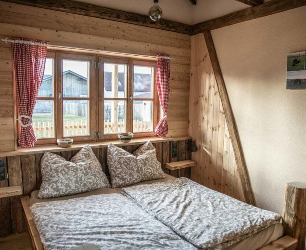 Urlaub am Erlebnishof Strasser - Ferienhaus Pferdeglück - Schlafzimmer