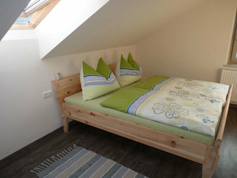 Ferienwohnung Kaminfeuer - Schlafzimmer